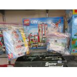 A boxed Lego City set 60110 Fire Station together with unboxed Lego City set 60003 Fire Emergency