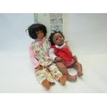 A Sigikid box containing a John Nissen artist doll and another,