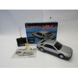 A boxed Asahi radio controlled Ford Sierra XR4i