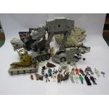 A collection of Star Wars vehicles including At-At, Millenium Falcon, X-Wing etc, figures,