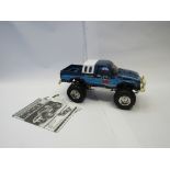 A Tamiya 1/10 scale radio controlled Toyota Bruiser 4x4 pick-up truck (vehicle only)