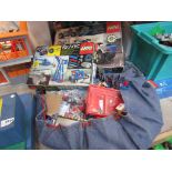 A large bag of loose Lego pieces and boxed items,