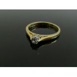 An 18ct gold diamond solitaire ring, 0.20ct approx. Size J/K, 2.