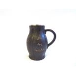 A Doulton Slaters leather effect puzzle motto tankard with silver rim, London 1891,