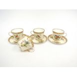 Three Royal Worcester cups and saucers plus on cup,