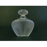 A Lalique perfume bottle - 'Singapore' pattern, in original box with paperwork.