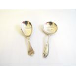 Two silver caddy spoons one of trefoil form 1961 and 1918,
