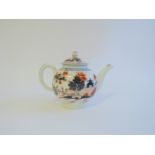 A Lowestoft porcelain Imari coloured "Doll's House" pattern tea pot and lid of spherical form,