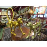 Two gilt figures of monkeys