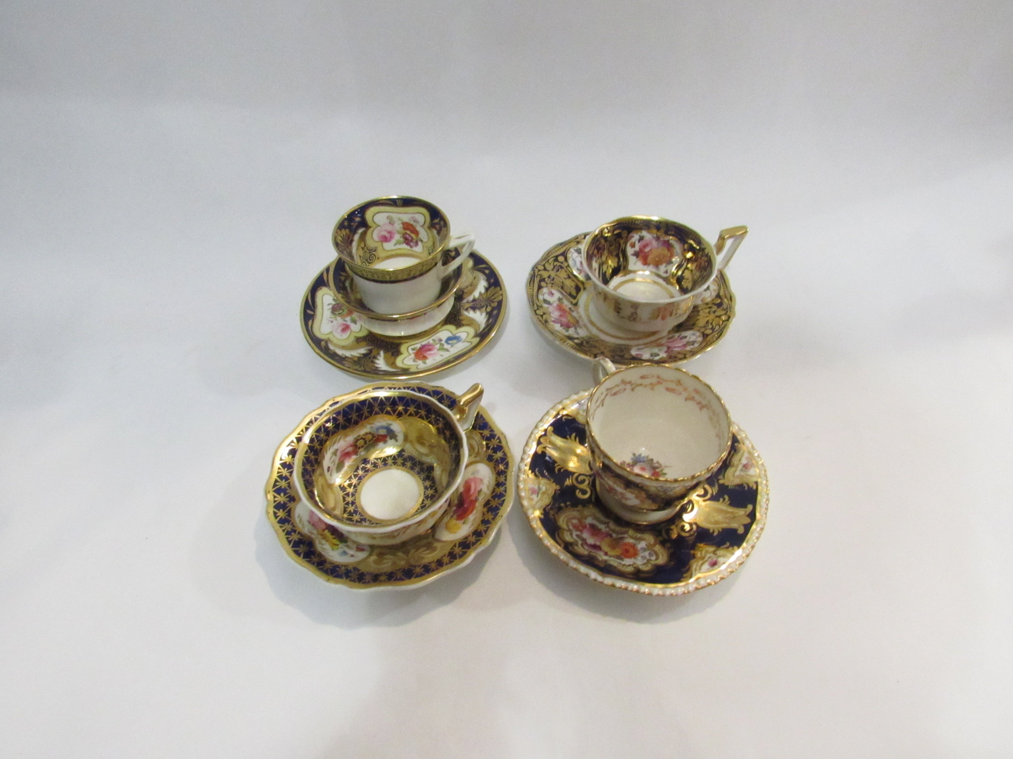 Three late 18th/early 19th Century cups and saucers,