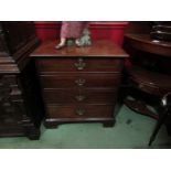 A George III mahogany cabinet the faux drawer drop-down front over two drawers on bracket feet.