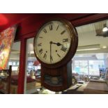 A Victorian mahogany drop-down striking wall clock