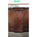 A Victorian mahogany 3 door combination wardrobe with 3 drawers in centre section.