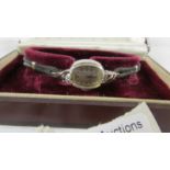 A Lady Elgin 14ct gold and diamond set wrist watch circa 1952, in original box.