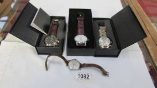 2 boxed Lige wrist watches and two others.