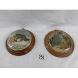 2 framed Pratt ware pot lids 'High Life' and 'The Snow Drift'.