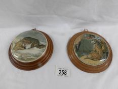 2 framed Pratt ware pot lids 'High Life' and 'The Snow Drift'.