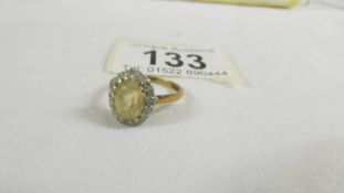 A 9ct gold cluster ring, size K half.