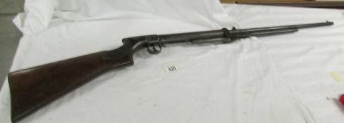 A BSA rosewood 177 calibre air rifle.