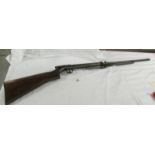 A BSA rosewood 177 calibre air rifle.