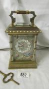 A very rare 19th cenutry striking carriage clock with Limoges panels depicting birds and insects,