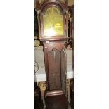 An oak cased 8 day long case clock with brass dial - Bunnett.