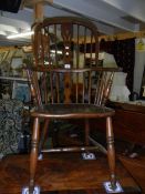 A Windsor chair. ****Condition report**** Joints solid.