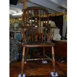 A Windsor chair. ****Condition report**** Joints solid.