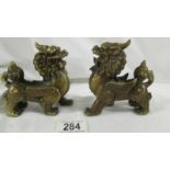Well cast pair of Chinese feng shui very detailed kylin statues. Height 12cm and 11cm.