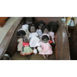 A good collection of 7 vintage black dolls.