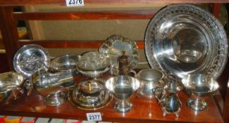 A mixed lot of silver plate including sugar scoop.