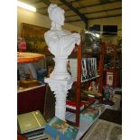A plaster female bust on pedestal, a/f.