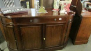 A good quality mahogany contemporary credenza.