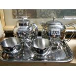 An unusual style 5 piece 'Olde Ball' stainless steel tea set.