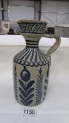 An early Delft jug, 23.5 cm tall, a/f (many chips).