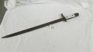 An old bayonet, length 54 cm, blade 42 cm.