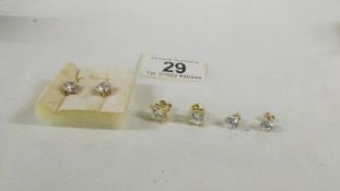 3 pairs of 9ct gold earrings set cubic zirconia's.