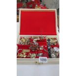 A jewellery box and costume jewellery.