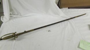 A good Victorian officer's sword with brass hilt and scabbard, (scabbard a/f).