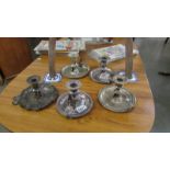 5 silver plate chamber candlesticks.