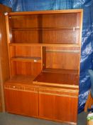 A teak drinks/display cabinet.