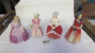 4 Royal Doulton figurines, 4" to 6" tall.