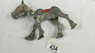 An early die cast Moko Muffin the Mule string puppet.