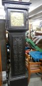 A carved oak case brass faced 19th century Grandfather clock, Winburn, Hexham.