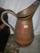 A large copper water jug.