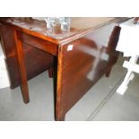 A good solid Victorian mahogany drop leaf table. ****Condition report**** 105.