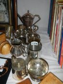 Approximately 11 silver plate jugs etc.