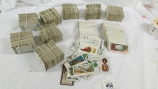 Approximately 2000 Ogdens cigarette cards from a variety of series including:- By The Roadside,