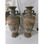 A pair of tall Satsuma vases, 46 cm tall.