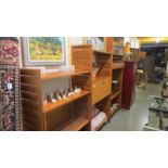 A 1970's teak interchangeable wall unit with maple walnut lined bureau.